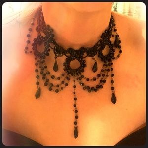Elaborate black beaded choker.